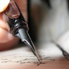 pen writing on paper